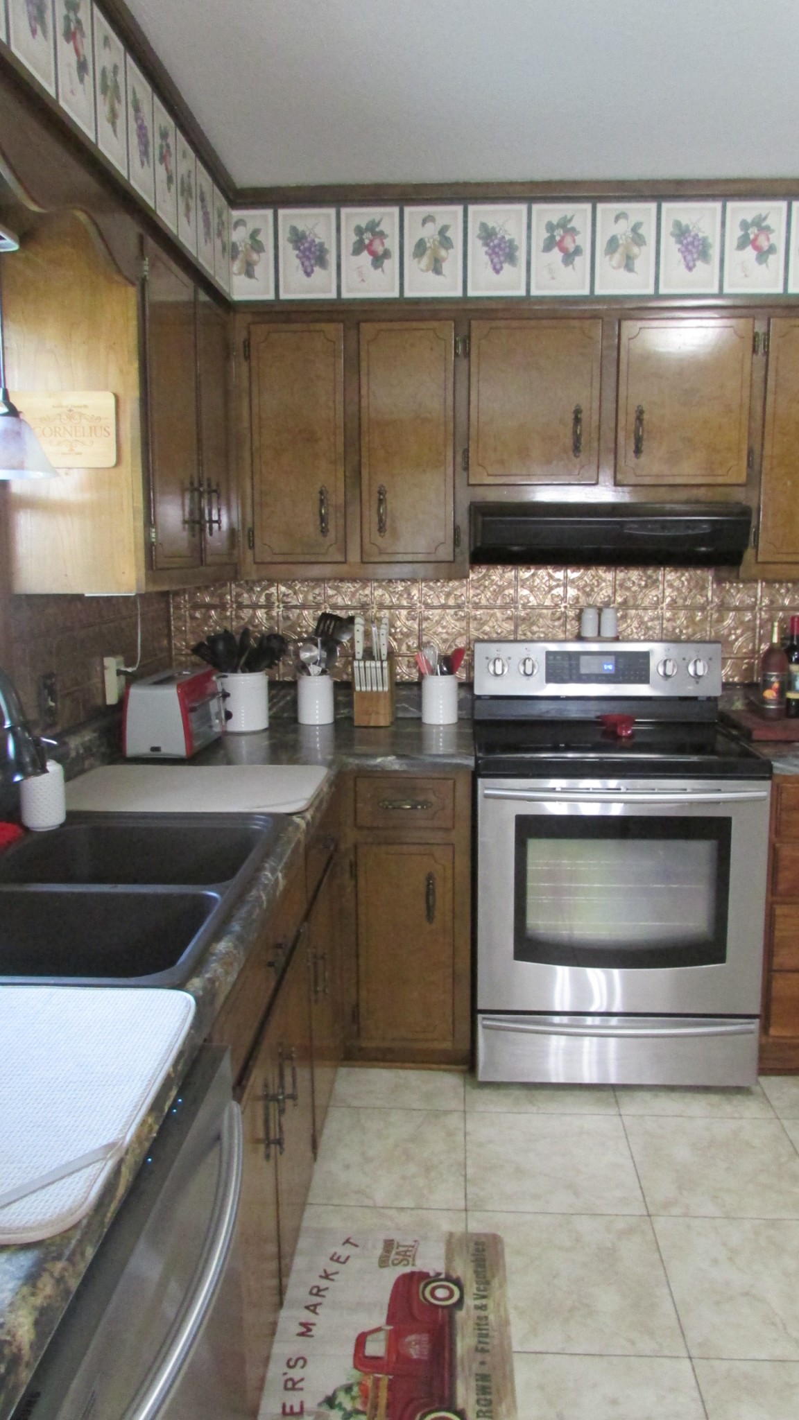 3455 Gimlet Road Lawrenceburg, TN 38464 - Photo 10 of 28 a kitchen with a stove and a sink