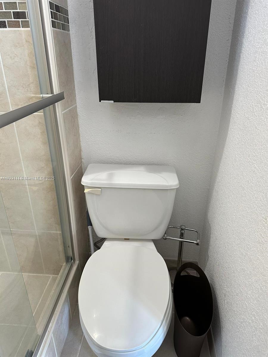 4001 South Ocean Drive, Unit 10D Hollywood, FL 33019 - Photo 19 of 28 a close view of a toilet in a bathroom