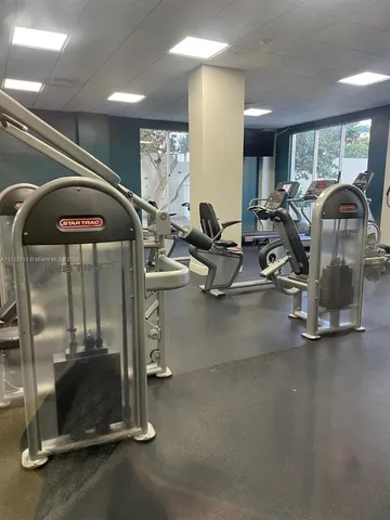 an aerial view of a house with outdoor space and lake view