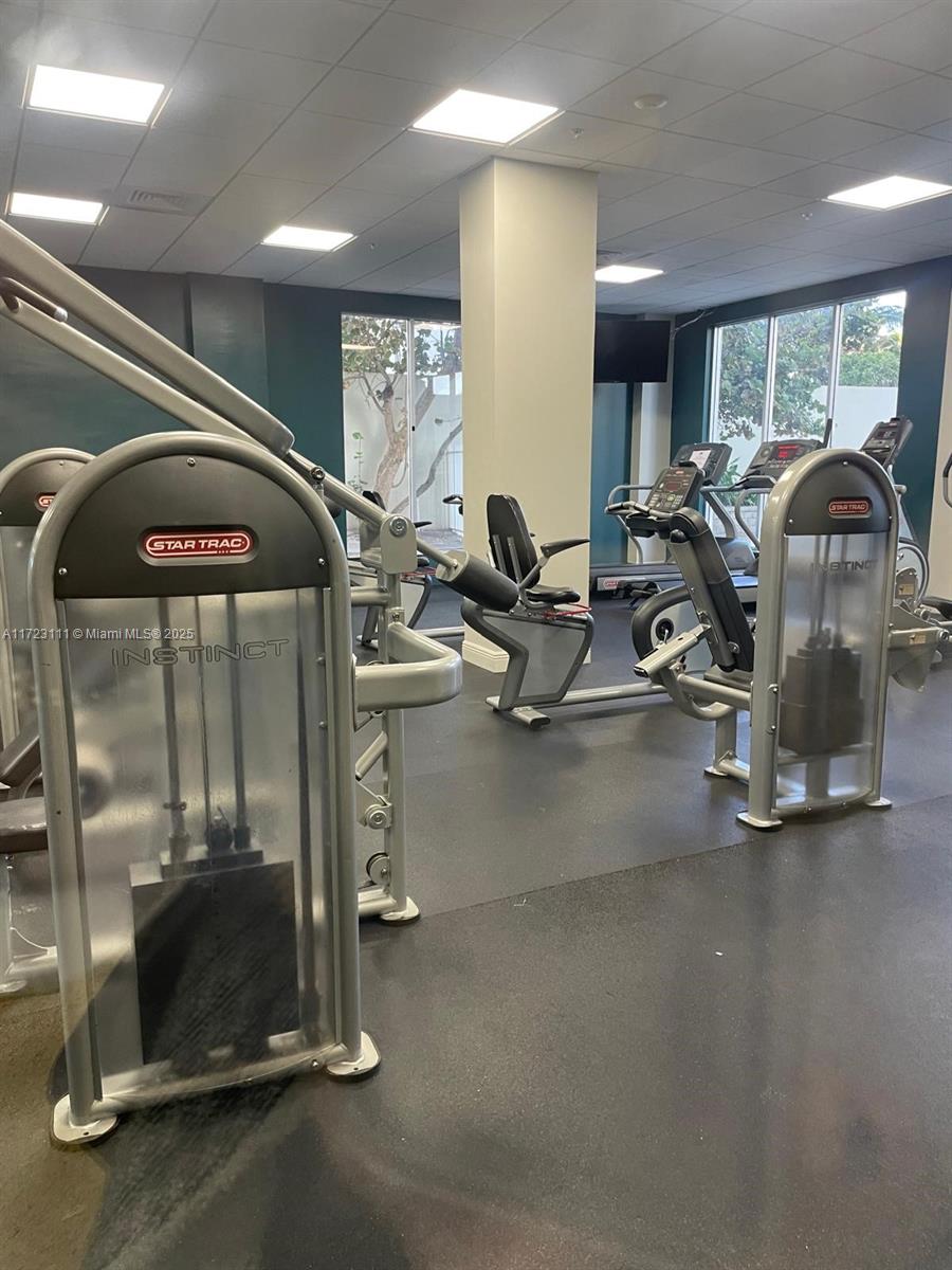 4001 South Ocean Drive, Unit 10D Hollywood, FL 33019 - Photo 22 of 28 a room with gym equipment