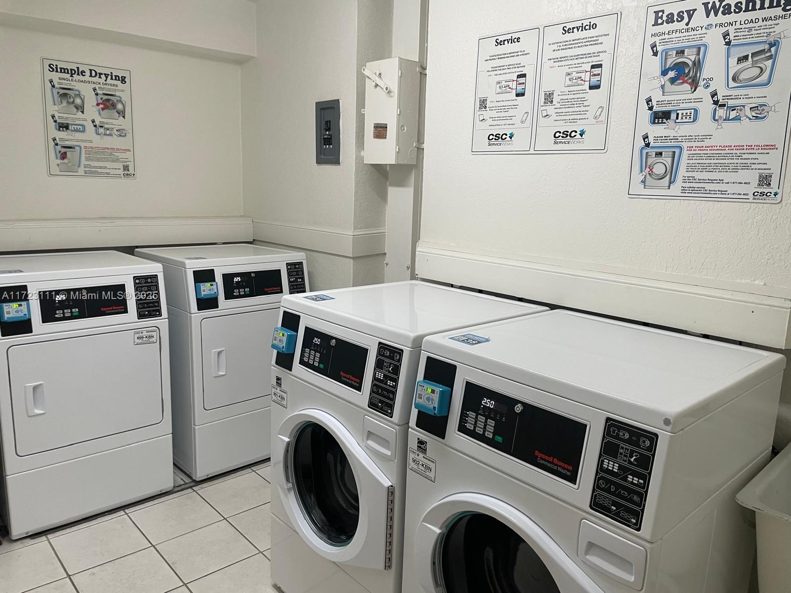 4001 South Ocean Drive, Unit 10D Hollywood, FL 33019 - Photo 27 of 28 a utility room with dryer and washer