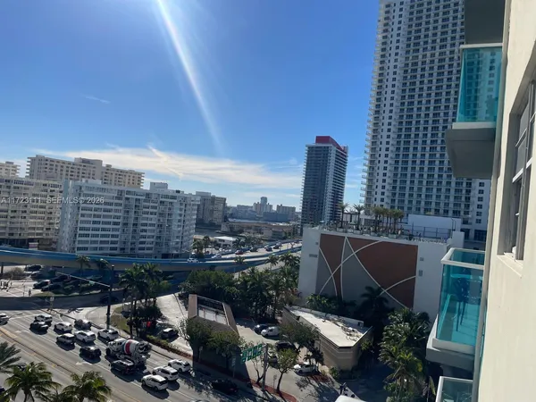 a swimming pool with outdoor seating and yard