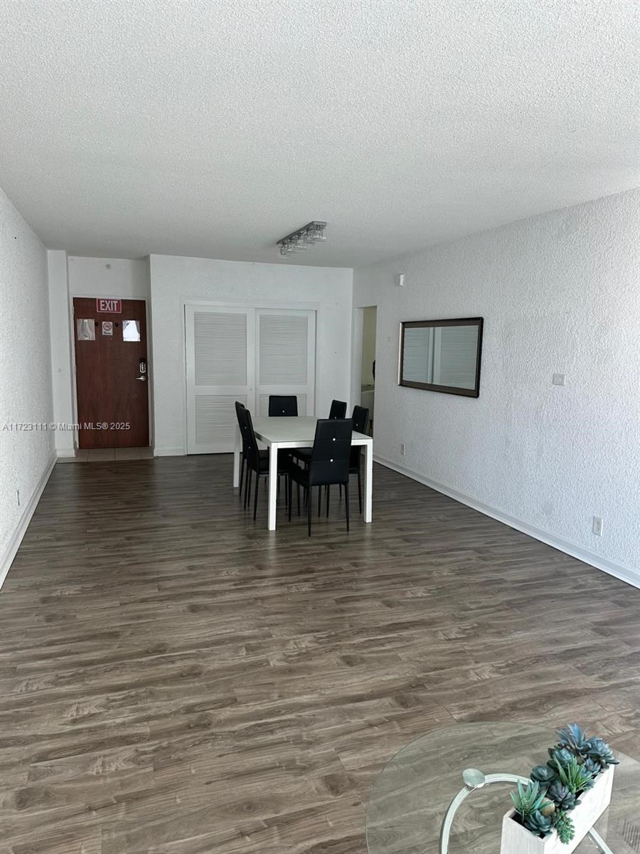 4001 South Ocean Drive, Unit 10D Hollywood, FL 33019 - Photo 7 of 28 a view of a dining room with furniture