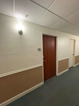 a view of balcony with wooden floor