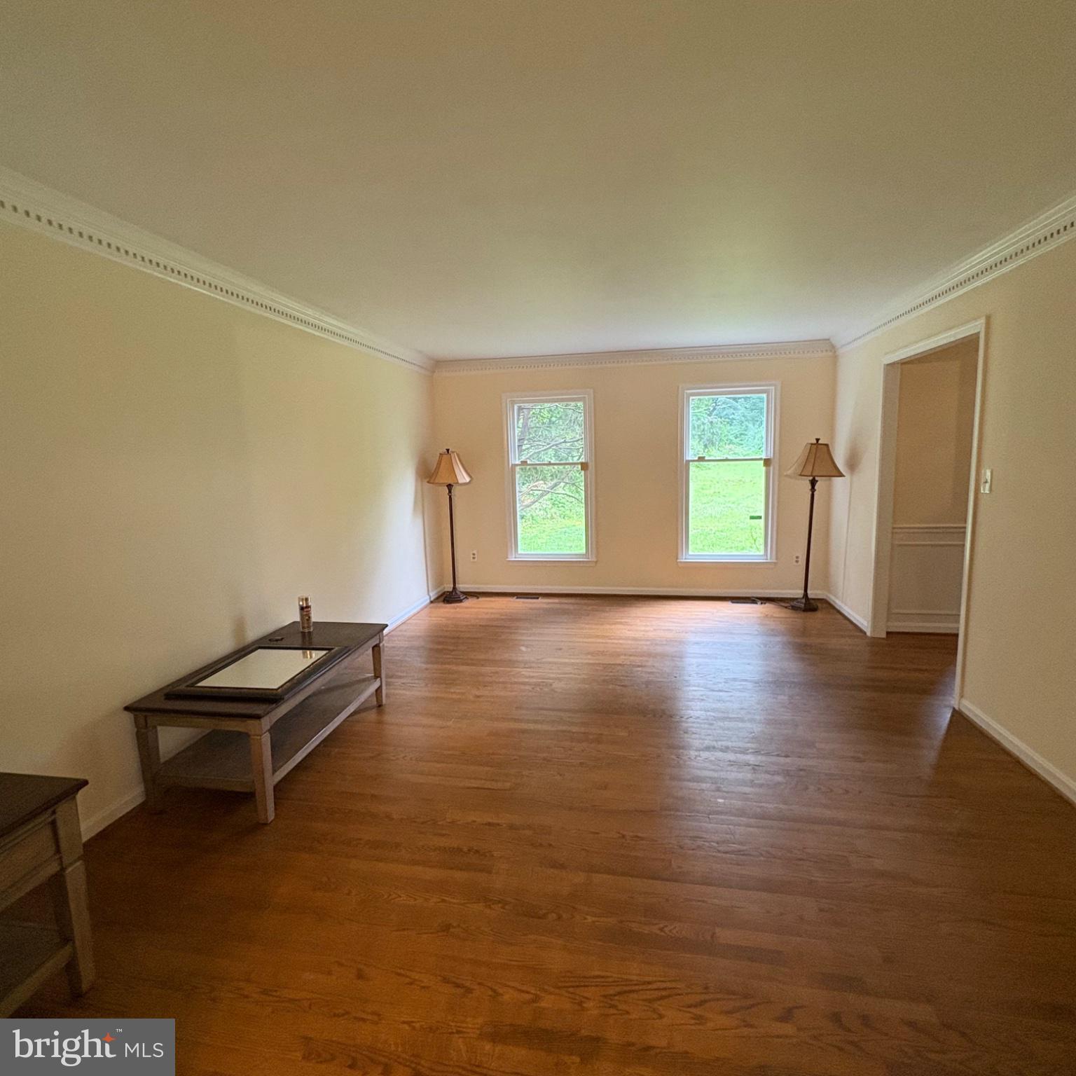 3502 Holly Road Annandale, VA 22003 - Photo 30 of 57 a view of a room with window and wooden floor
