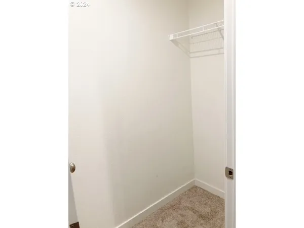a bathroom with a sink double vanity and a tub