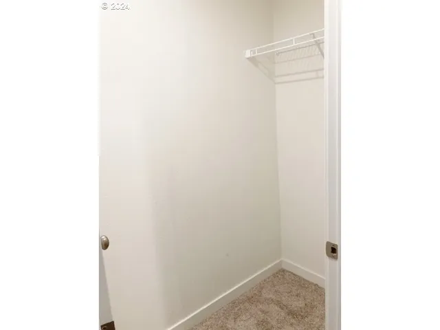 a bathroom with a sink double vanity and a tub