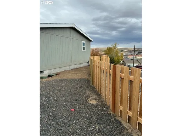 a house view with a backyard space