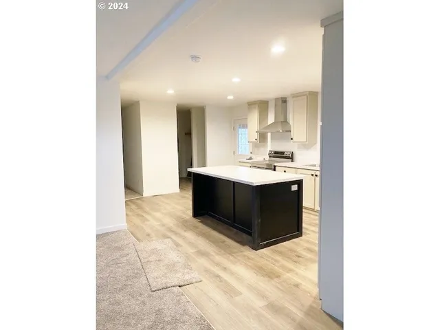 a bathroom with a sink double vanity and a mirror