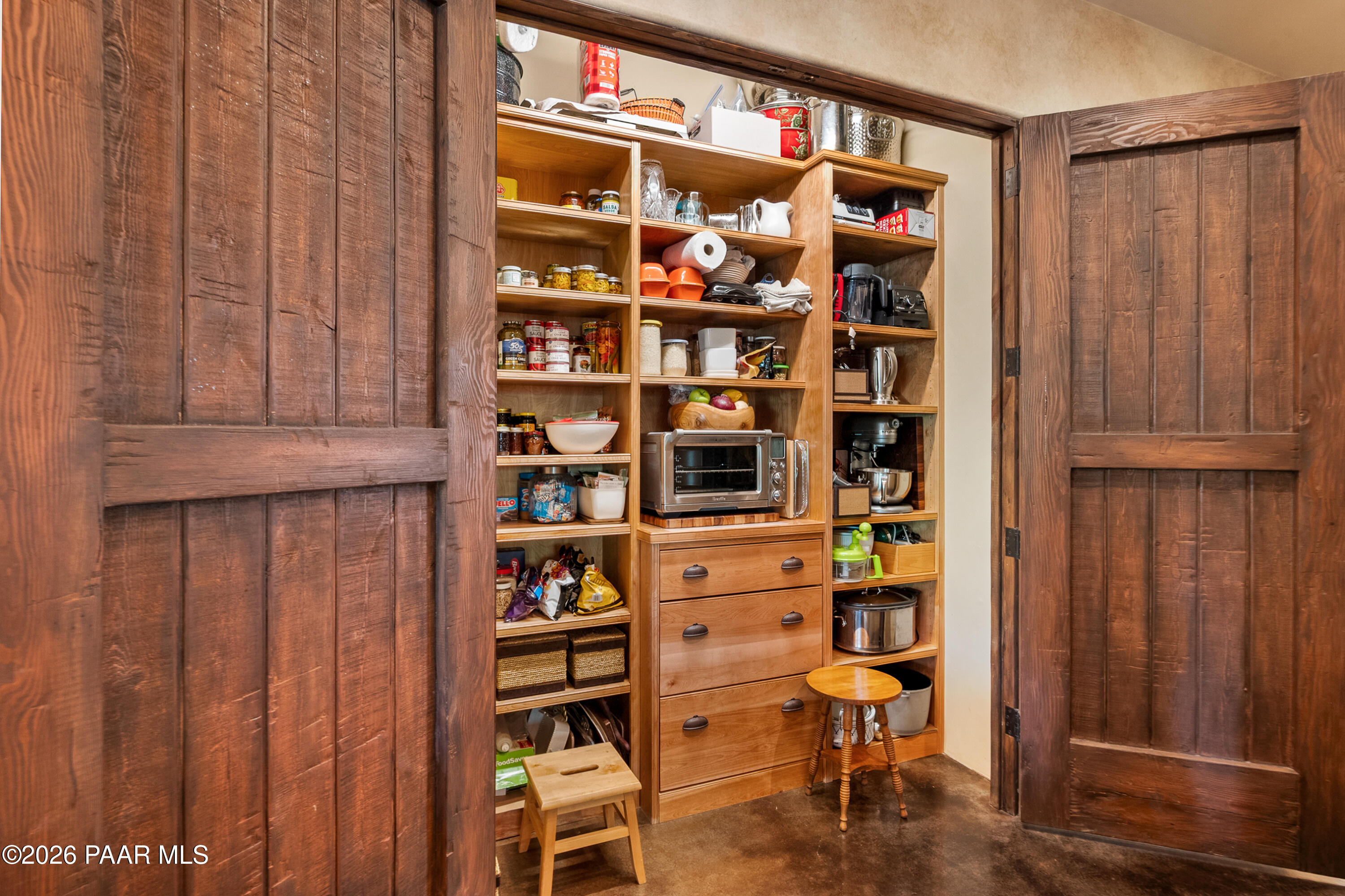 1515 High Valley Ranch Road Prescott, AZ 86303 - Photo 27 of 76 a view of walk in closet with clothes and shoes