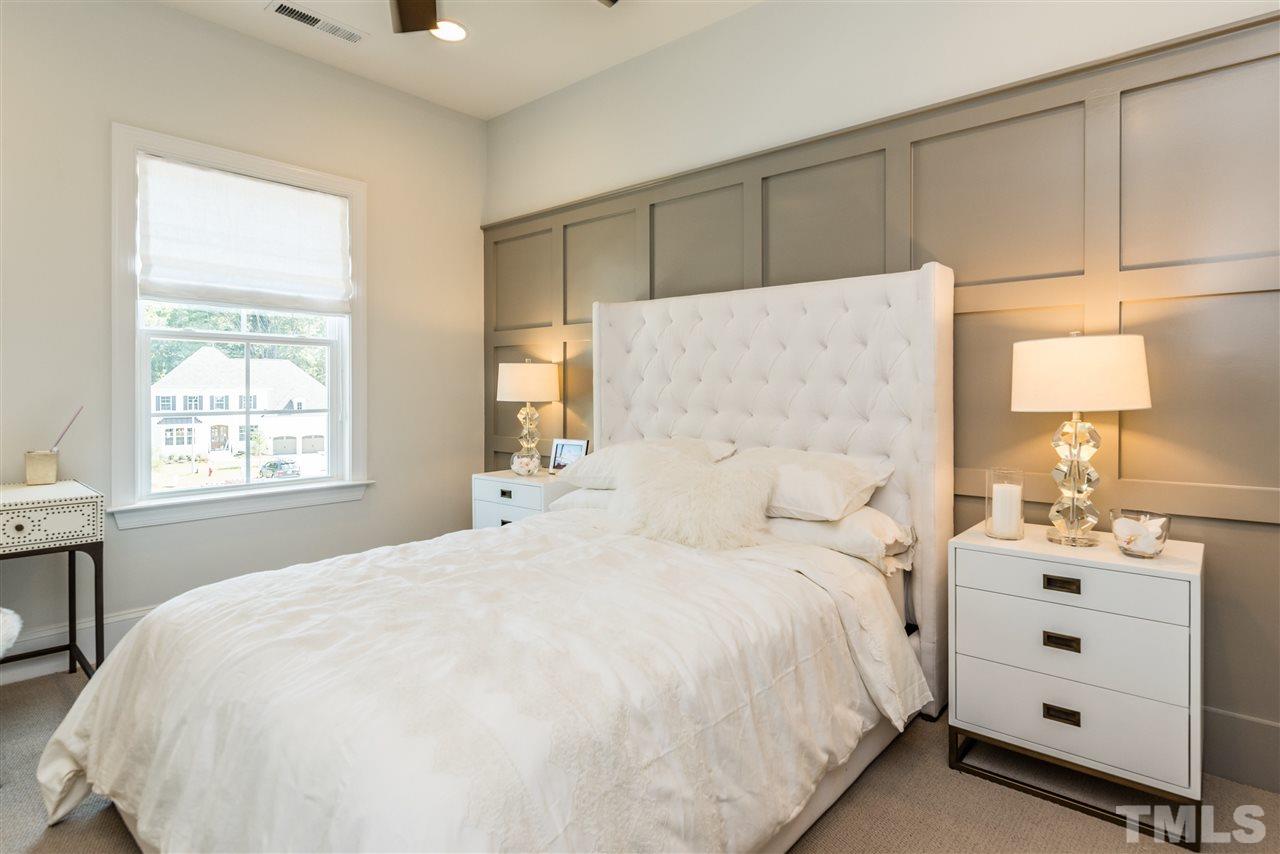 5285 Aleppo Lane Raleigh, NC 27613 - Photo 13 of 25 a large white bed in a white room