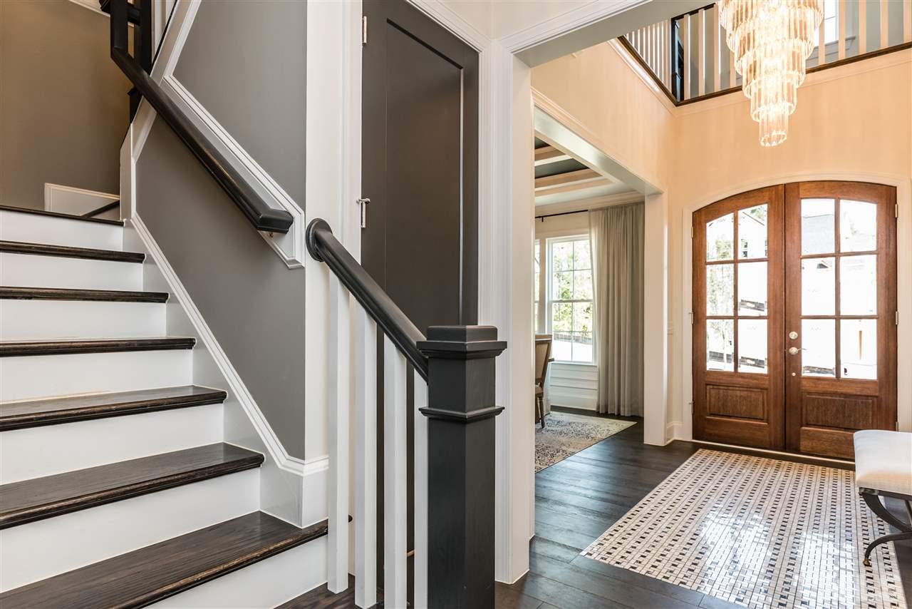 5285 Aleppo Lane Raleigh, NC 27613 - Photo 3 of 25 a view of entryway and hall with wooden floor