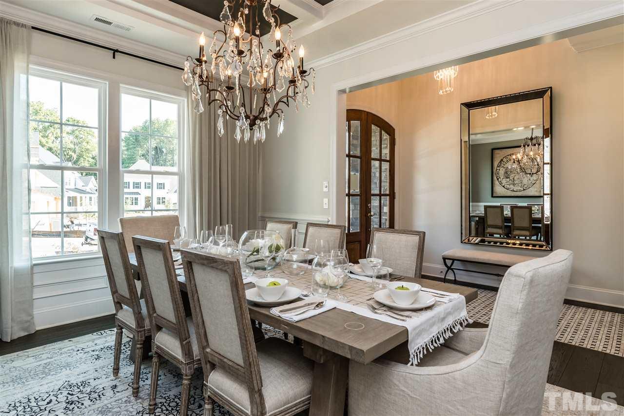 5285 Aleppo Lane Raleigh, NC 27613 - Photo 4 of 25 a view of a dining room with furniture window and outside view