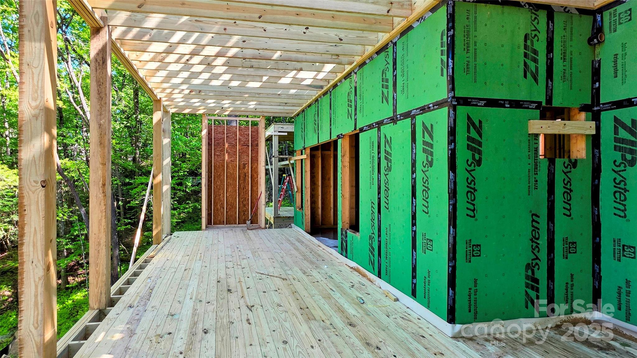 297 Easy Springs Road Sapphire, NC 28774 - Photo 13 of 34 a view of a backyard with plants