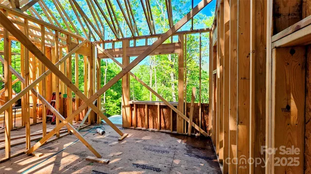 a view of front door with wooden floor