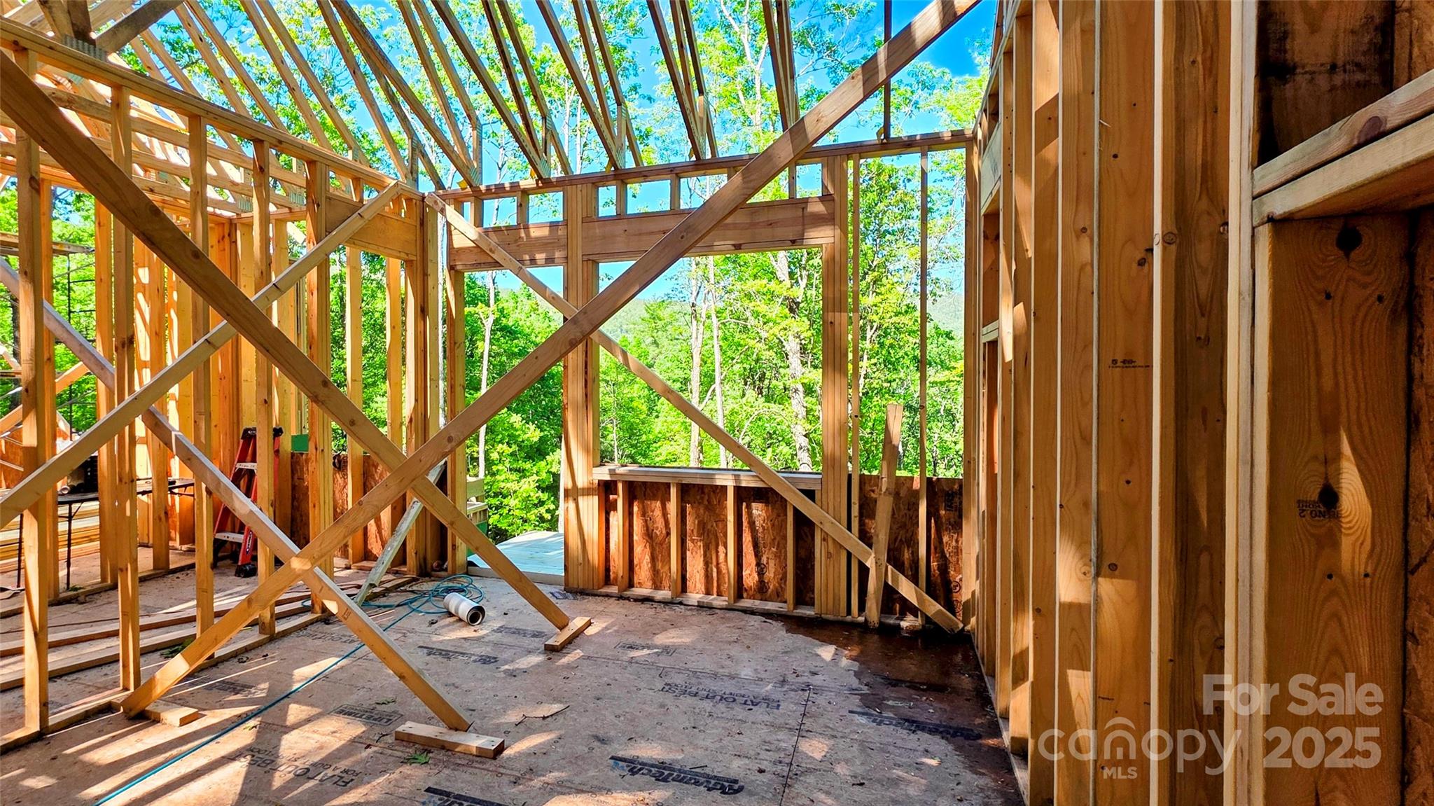 297 Easy Springs Road Sapphire, NC 28774 - Photo 16 of 34 a view of a porch with a yard