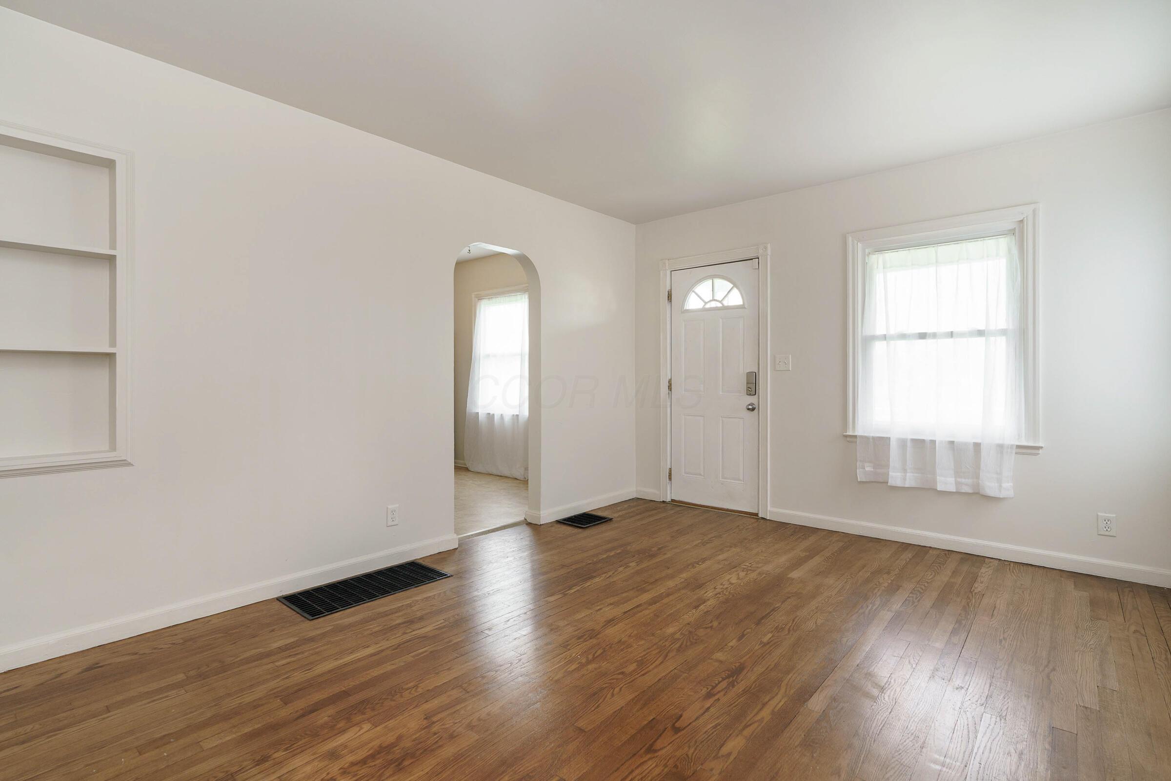 2780 Audubon Road Columbus, OH 43211 - Photo 4 of 32 Step inside to refinished wood floors and a freshly painted interior.