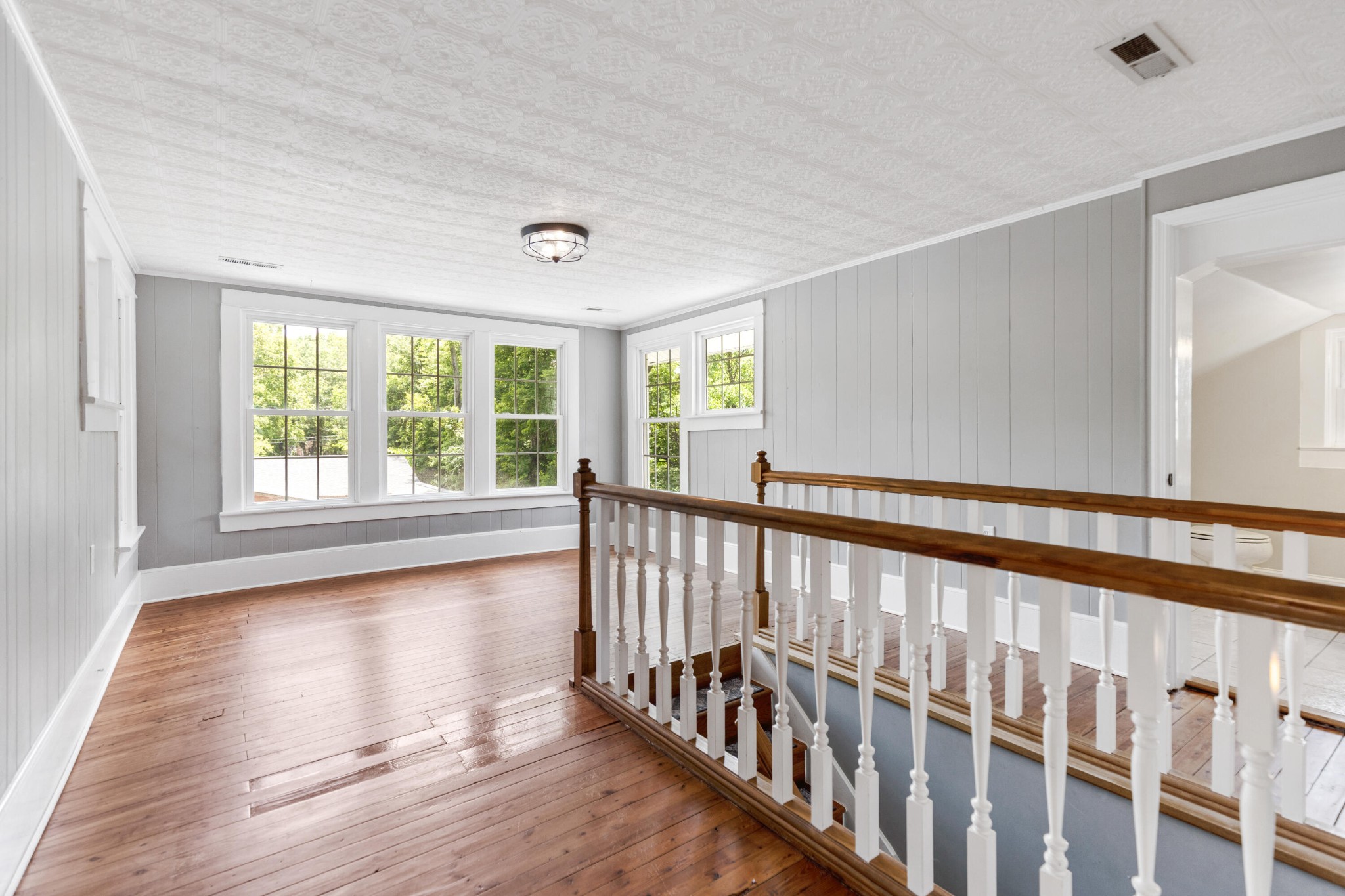 253 15th Street Northwest Cleveland, TN 37311 - Photo 25 of 35 a view of hallway with wooden floor and windows