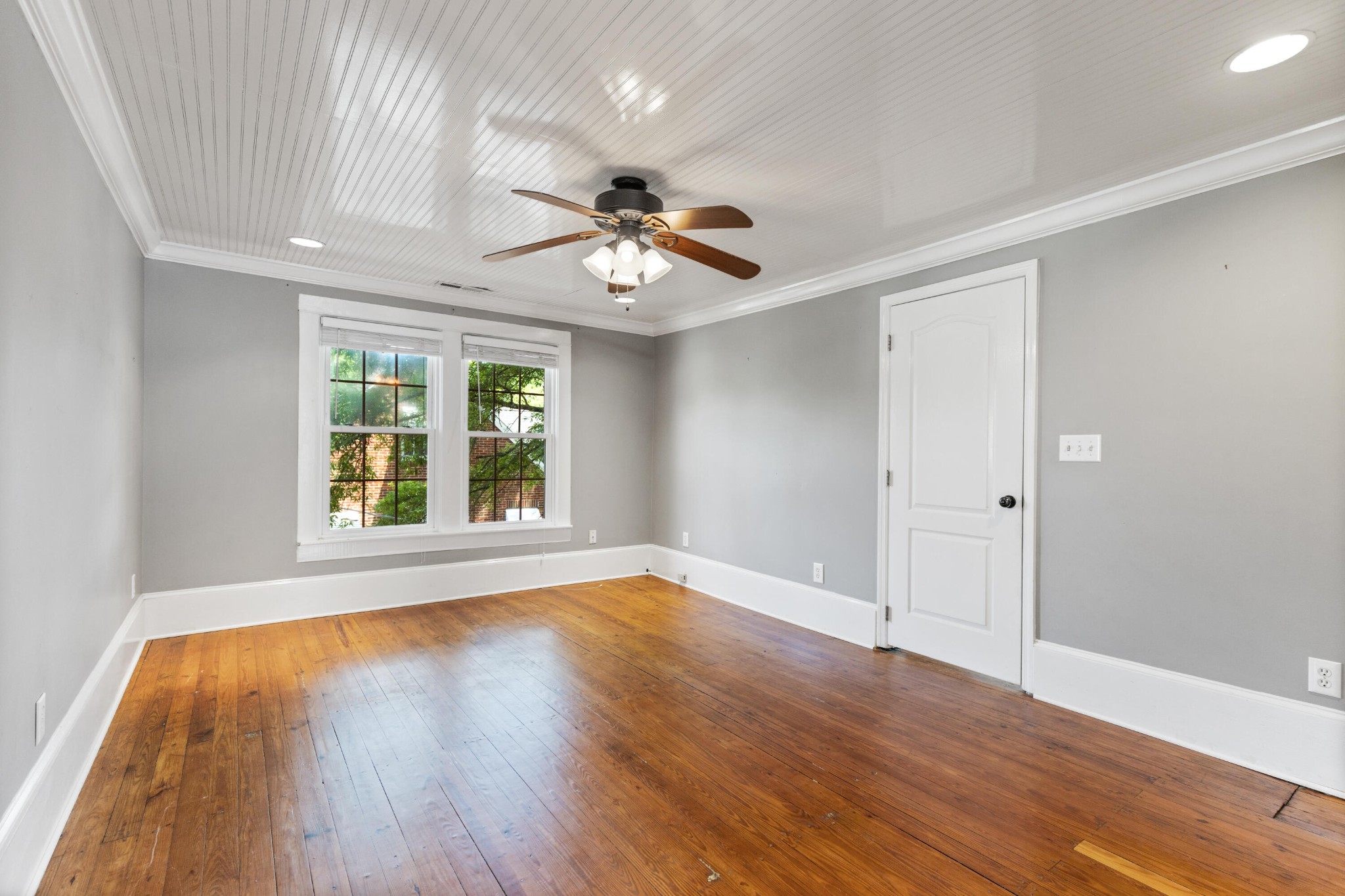 253 15th Street Northwest Cleveland, TN 37311 - Photo 27 of 35 a view of an empty room with a window and wooden floor