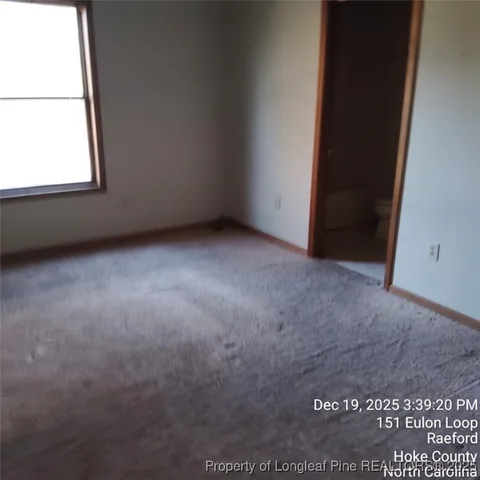 a view of a window in an empty room