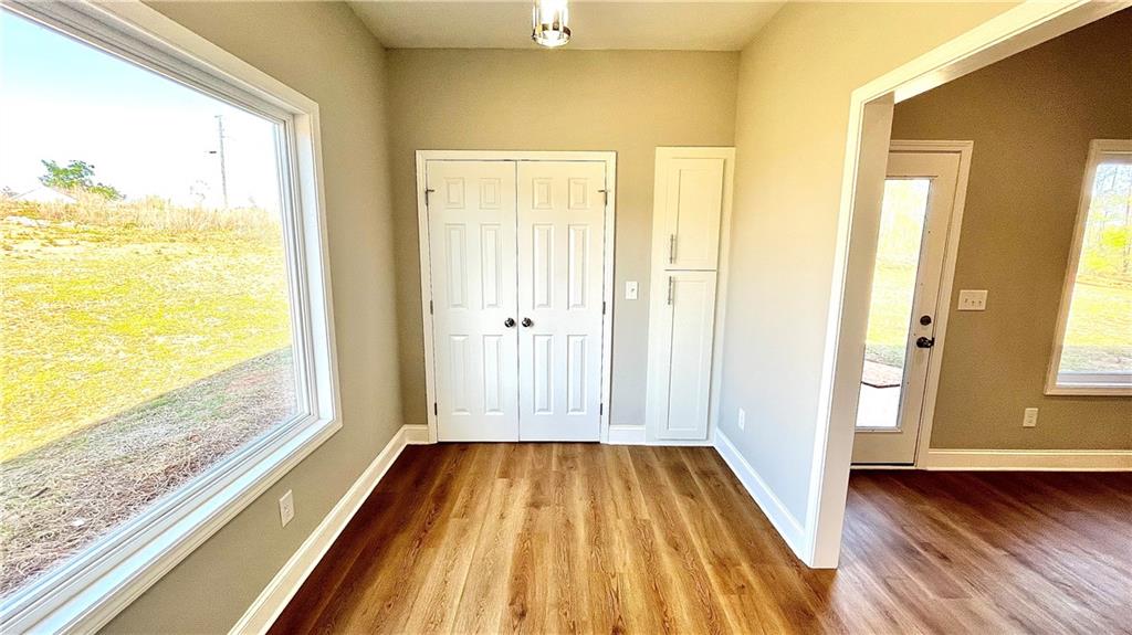 23 S Road Griffin, GA 30224 - Photo 11 of 32 a view of a room with wooden floor and door