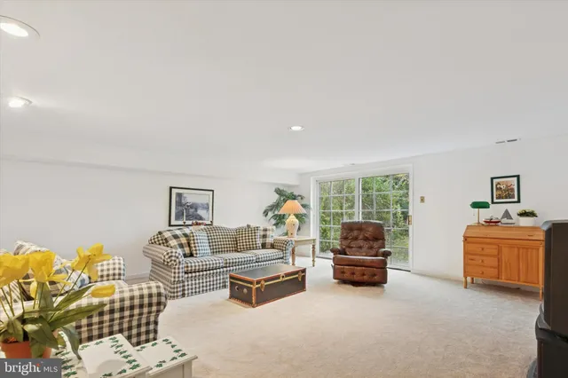 a living room with furniture and a couch