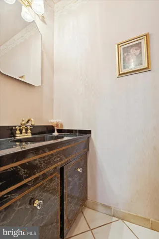 a close view of a stove top oven and cabinets