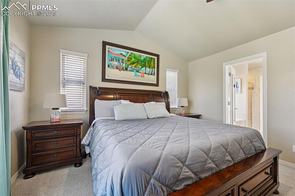 10214 Prairie Ridge Court Peyton, CO 80831 - Photo 18 of 42 a bedroom with a bed and a window