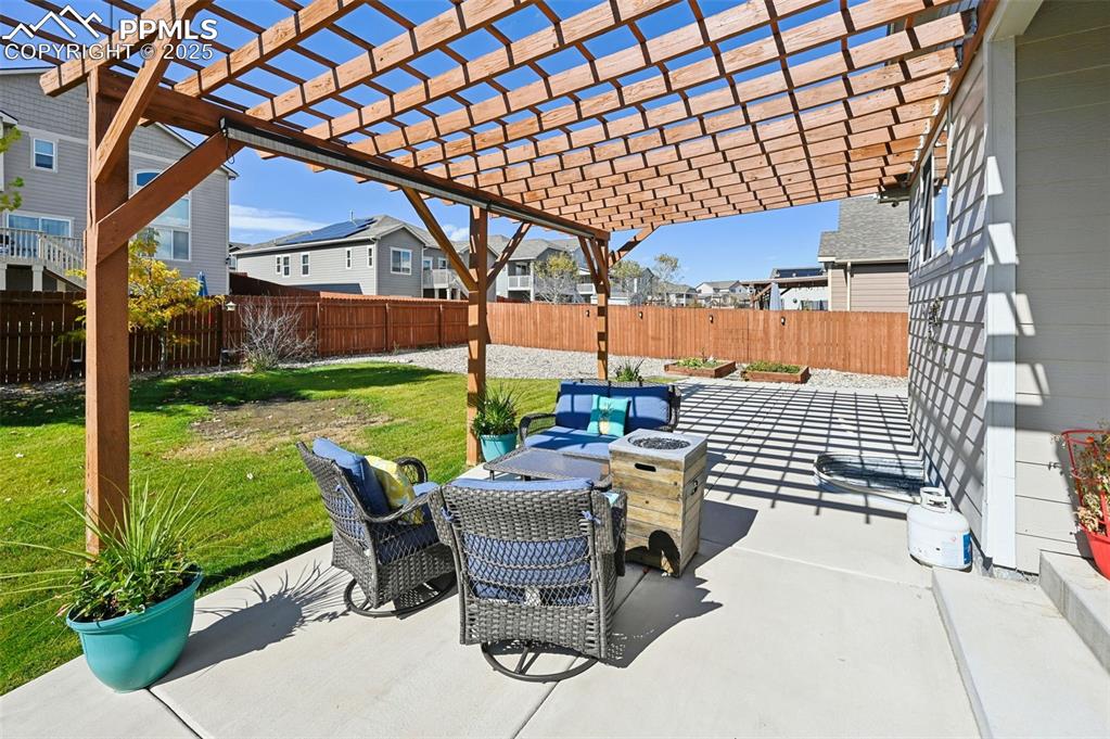 10214 Prairie Ridge Court Peyton, CO 80831 - Photo 32 of 42 a view of yard with patio