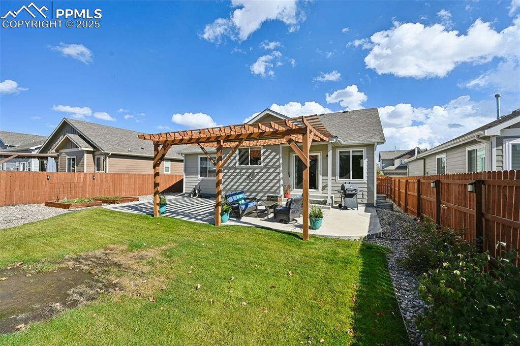 10214 Prairie Ridge Court Peyton, CO 80831 - Photo 33 of 42 a view of a house with backyard and porch