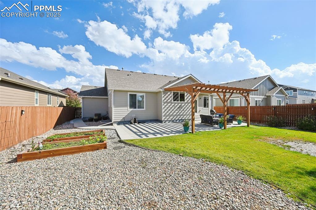 10214 Prairie Ridge Court Peyton, CO 80831 - Photo 34 of 42 a view of a house with swimming pool and porch with furniture