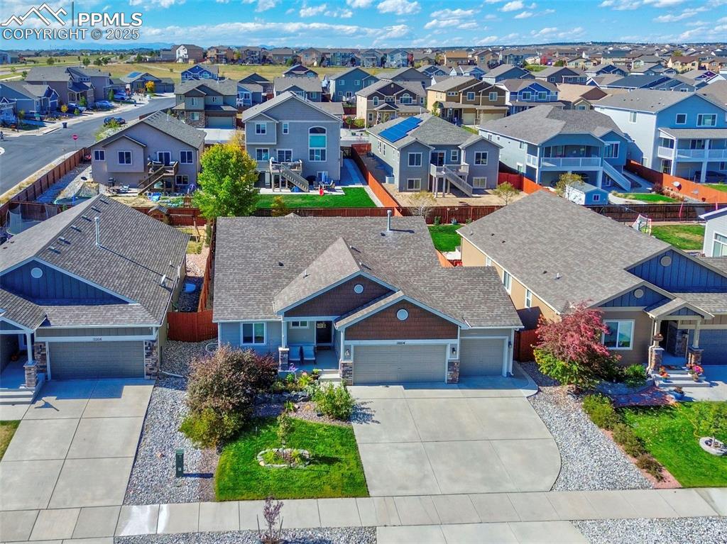 10214 Prairie Ridge Court Peyton, CO 80831 - Photo 36 of 42 an aerial view of multiple houses
