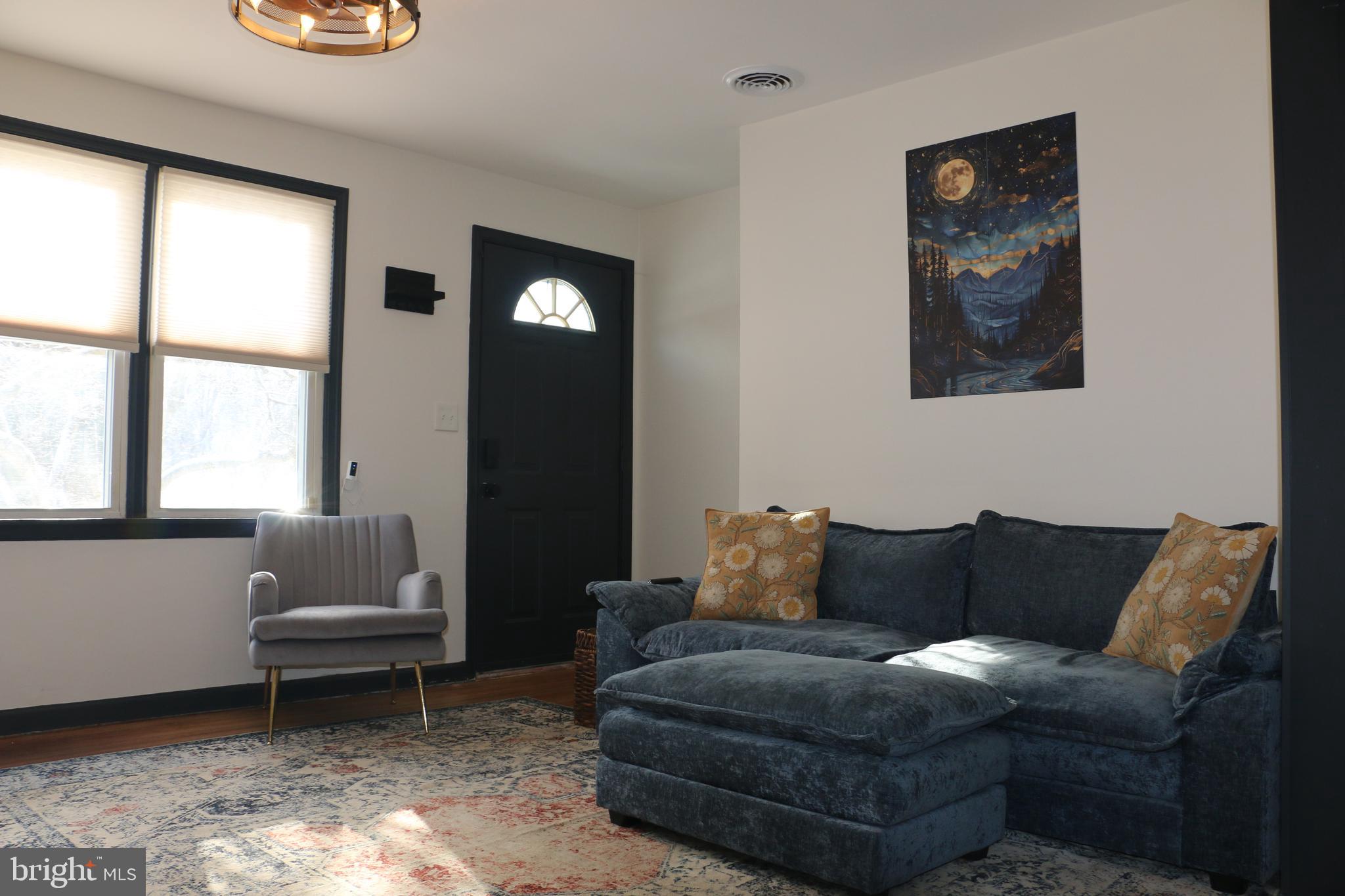 2717 Monmouth Road Jobstown, NJ 08041 - Photo 5 of 9 a living room with furniture and a window