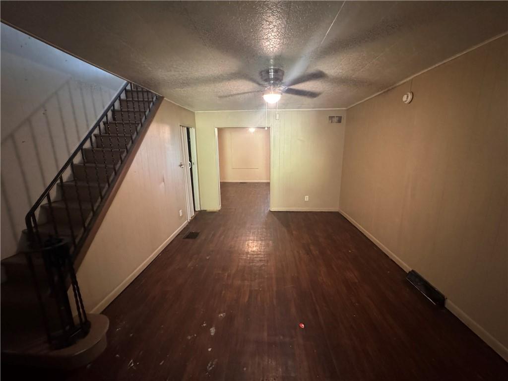 713 Freeport Road, Unit B Creighton, PA 15030 - Photo 3 of 11 an entryway in a hall with wooden floor and fan