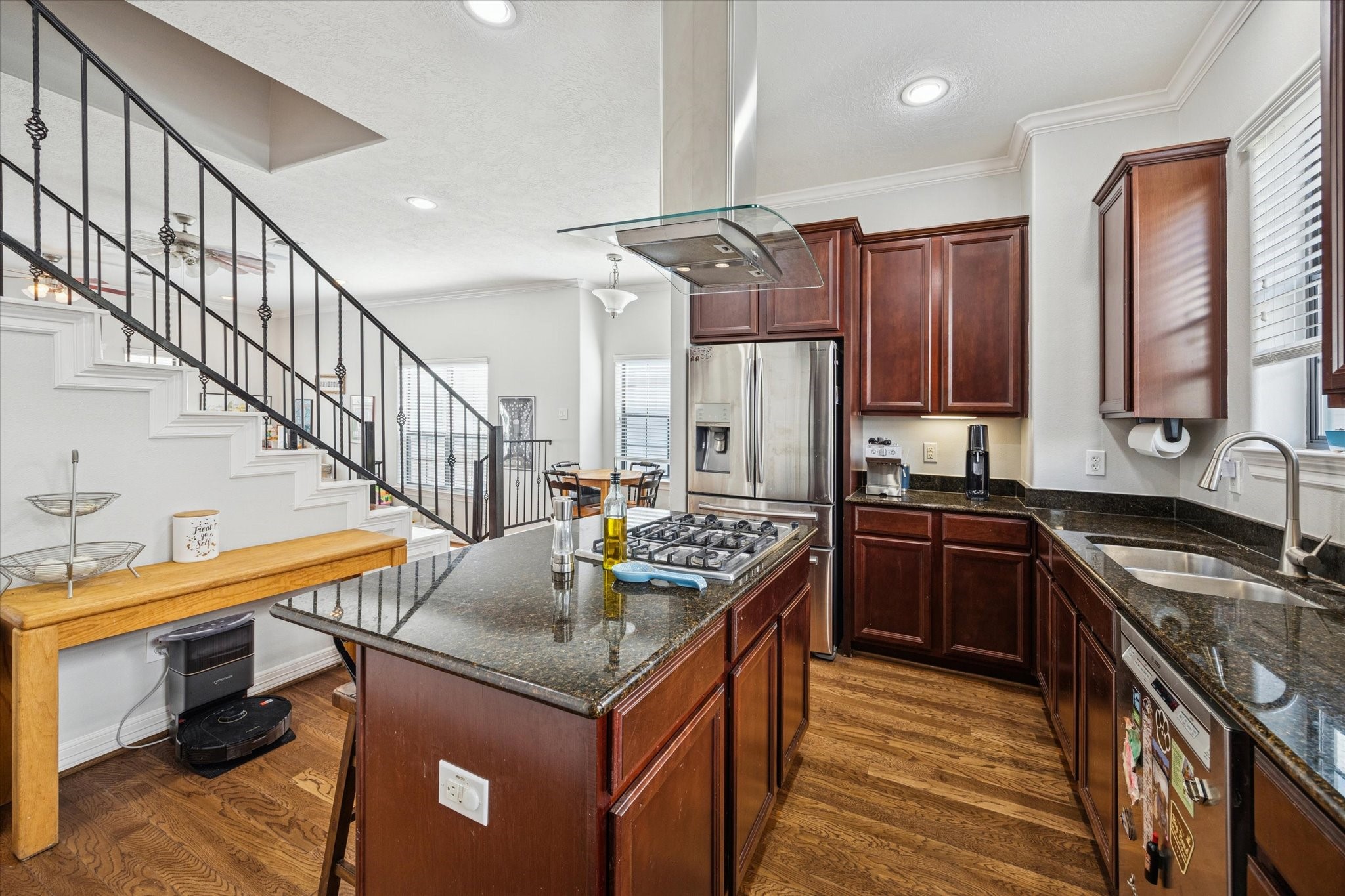 3203 Garden Oaks View Houston, TX 77018 - Photo 5 of 13 a kitchen with stainless steel appliances granite countertop a sink a stove and a refrigerator