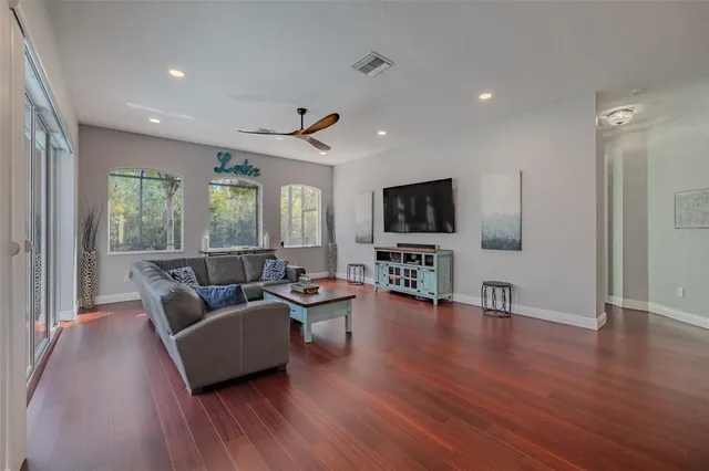 a view of a swimming pool with a patio
