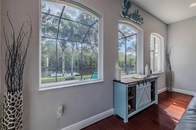a view of a swimming pool with an outdoor space and seating area