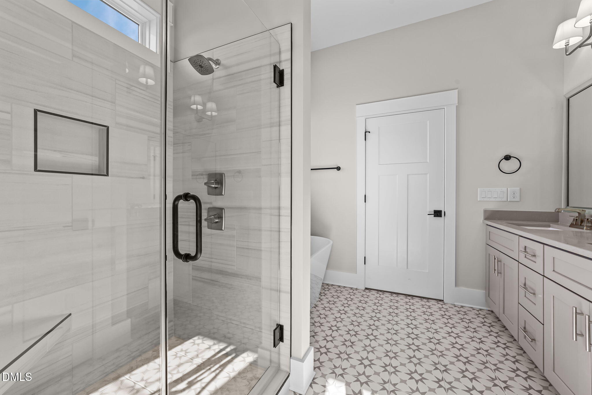 2568 Lassiter Road Four Oaks, NC 27524 - Photo 24 of 50 a bathroom with a shower and a sink