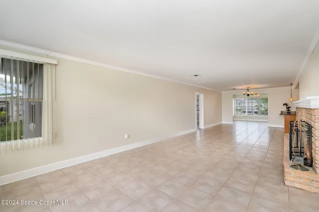 a view of a livingroom with wooden floor