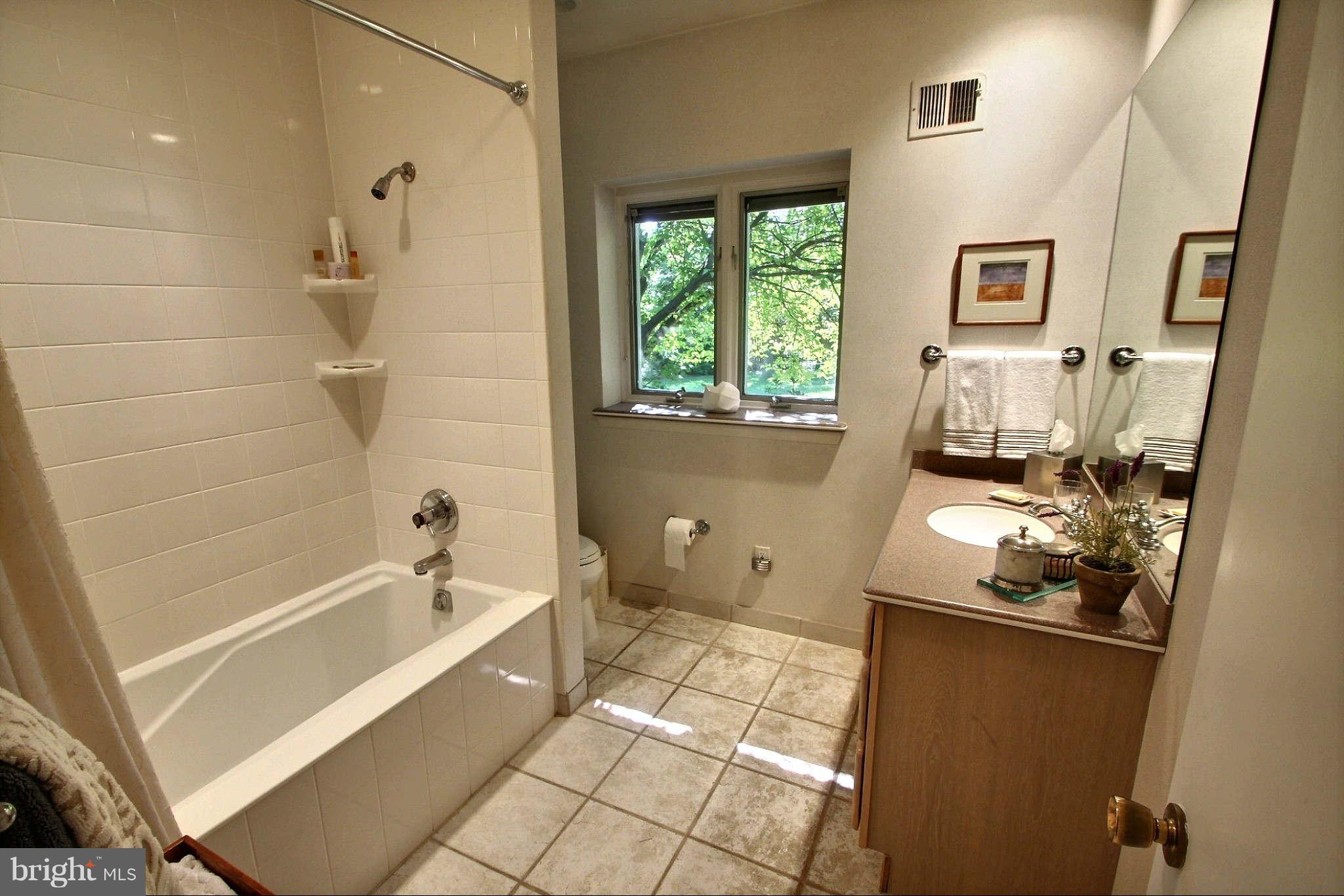 9410 Persimmon Tree Road Potomac, MD 20854 - Photo 22 of 30 Hall Bathroom