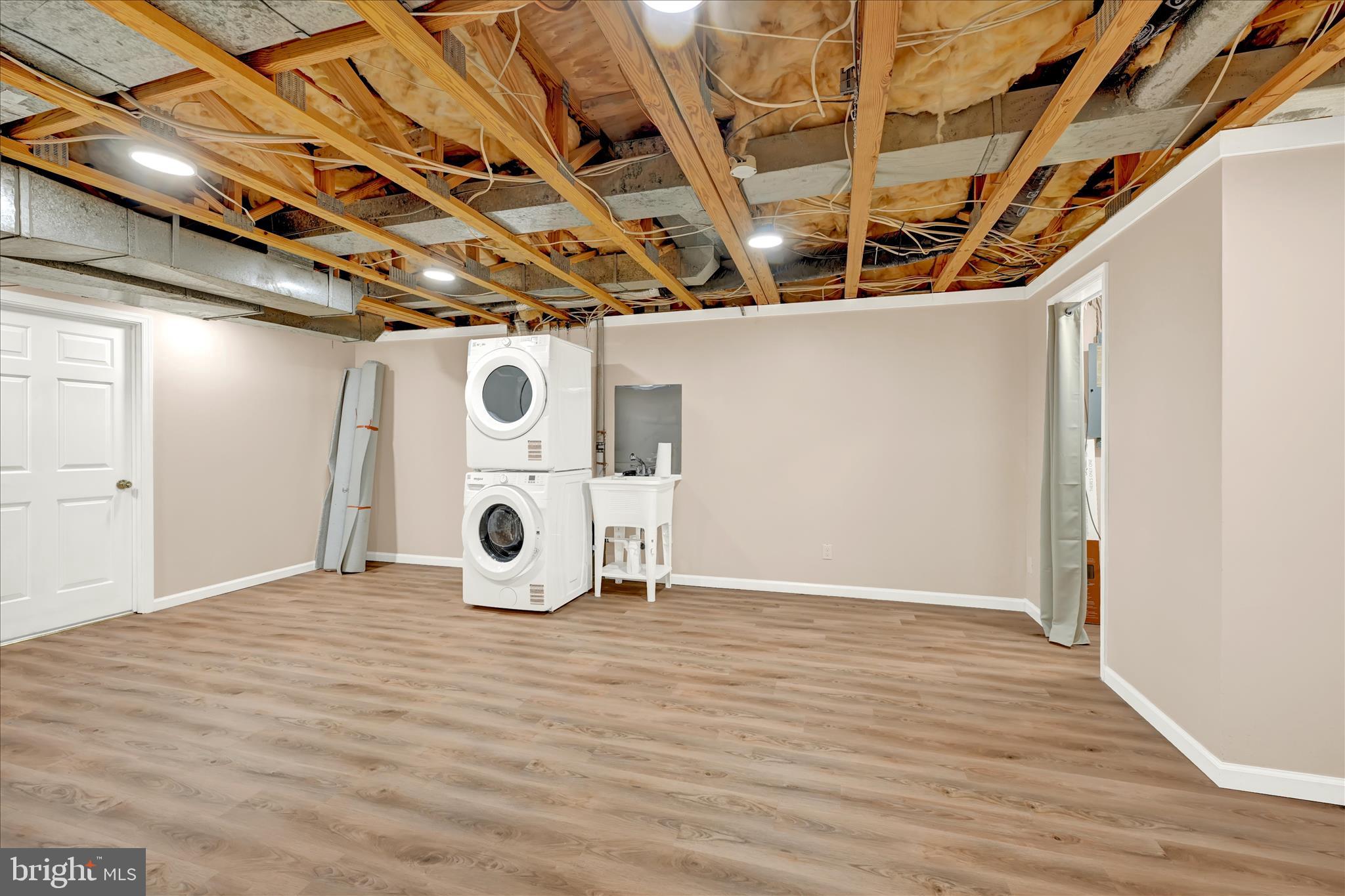 2317 Wonderview Road Lutherville-Timonium, MD 21093 - Photo 22 of 27 a view of a utility room with wooden floor