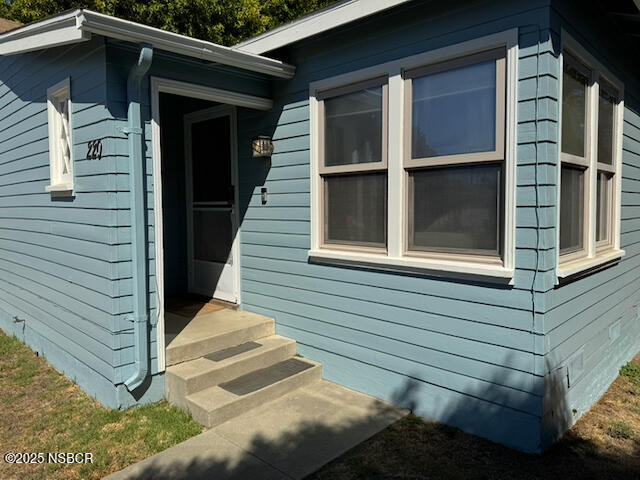 220 North F Street Lompoc, CA 93436 - Photo 1 of 15 a view of house with window and wooden fence