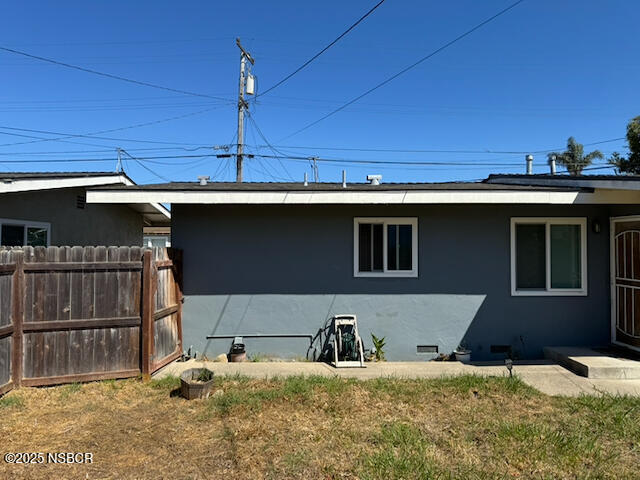 220 North F Street Lompoc, CA 93436 - Photo 14 of 15 a view of a house with a patio