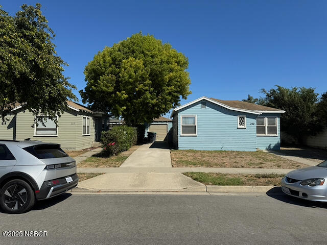 220 North F Street Lompoc, CA 93436 - Photo 2 of 15 a view of a car parked in front of a house