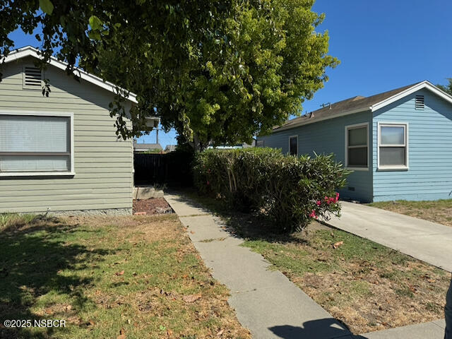 220 North F Street Lompoc, CA 93436 - Photo 6 of 15 a view of a backyard of the house