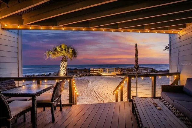 a view of a livingroom with furniture and a table