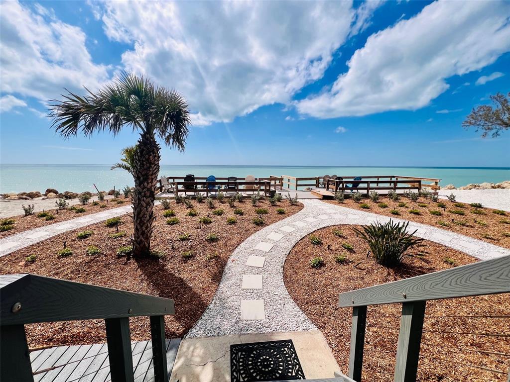 5030 North Beach Road, Unit 3 Englewood, FL 34223 - Photo 14 of 67 a view of swimming pool with a terrace