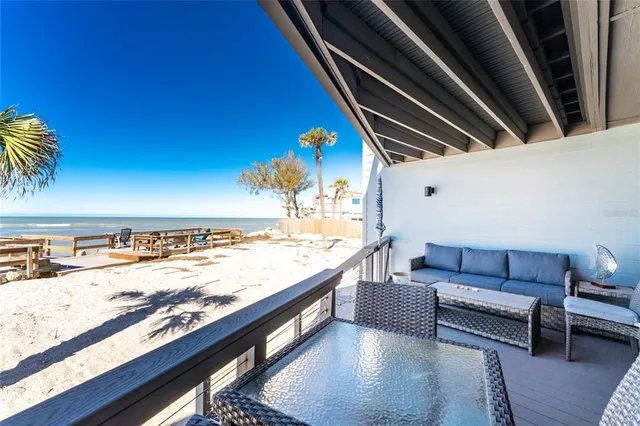 a kitchen with cabinets stainless steel appliances and a sink