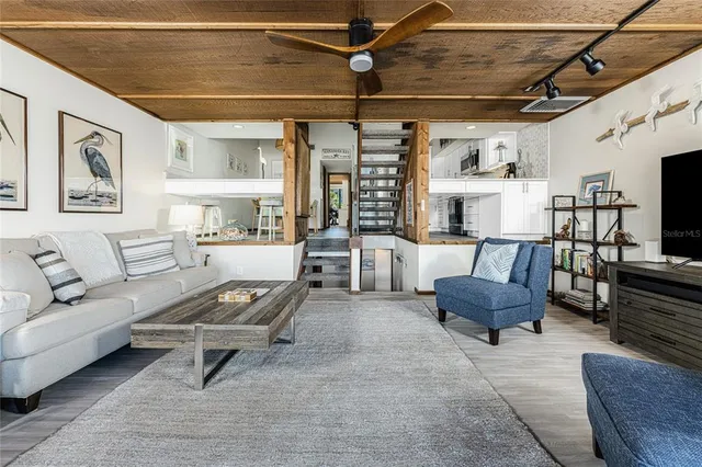 a kitchen with stainless steel appliances granite countertop a stove and a microwave
