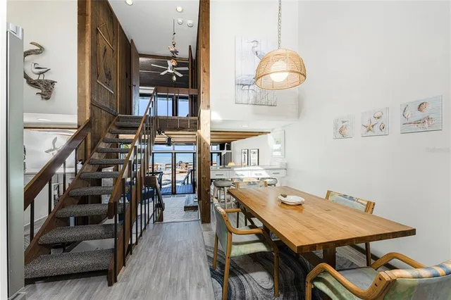 a kitchen with stainless steel appliances a sink dishwasher a stove and cabinets